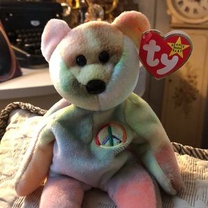 1996 Vintage Peace Beanie Baby . NWT . Never played with .